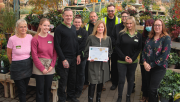 Sarah Dempsey, centre with certificate) sharing success with Notcutts Woodbridge garden centre